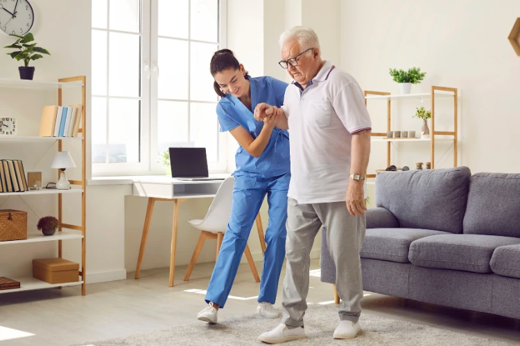 Man walking with a care manager in his home