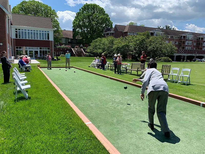 older people playing bocce ball at Waverly Height, a life plan community