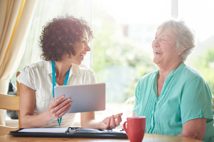 a care manager talking with an elderly woman