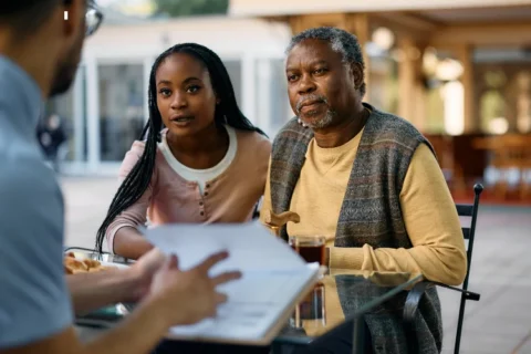 two people talking to a geriatric care manager