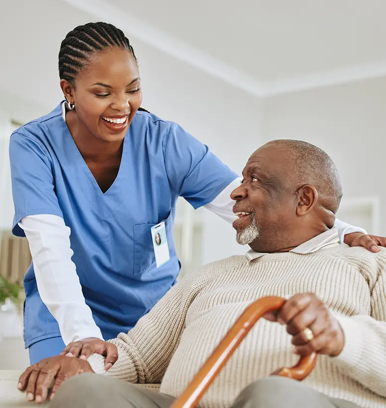 nurse with resident at home